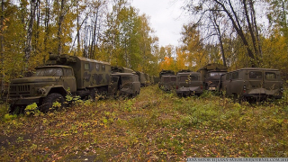 Illustration for article titled Excellent pictures of abandoned Russian military vehicles found in the woods